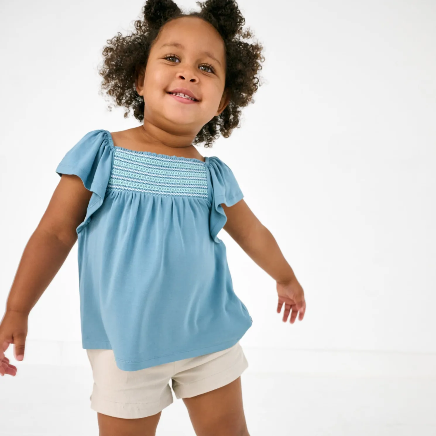 Dusk Blue Smocked Flutter Top