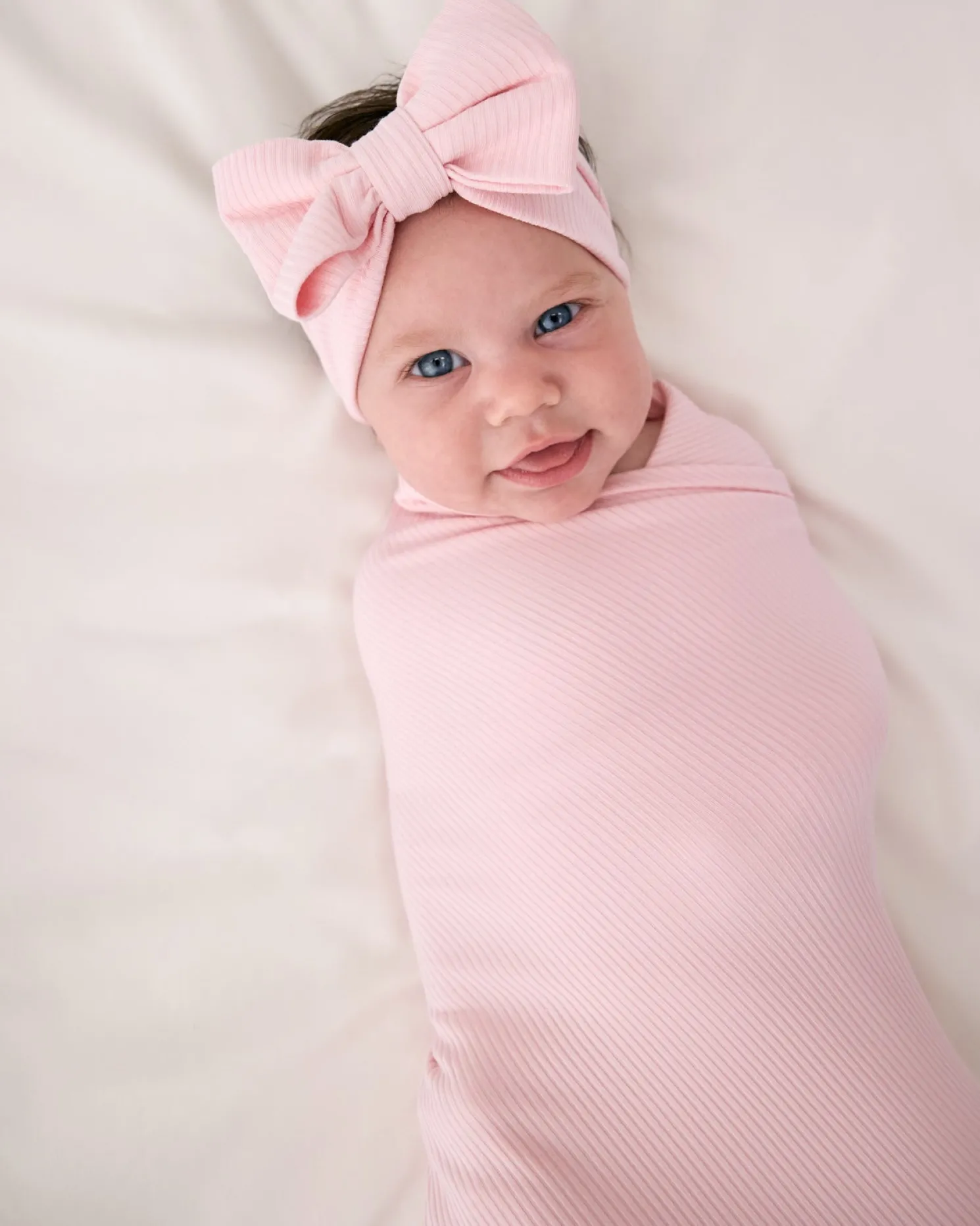 Prima Pink Ribbed Swaddle & Luxe Bow Headband Set