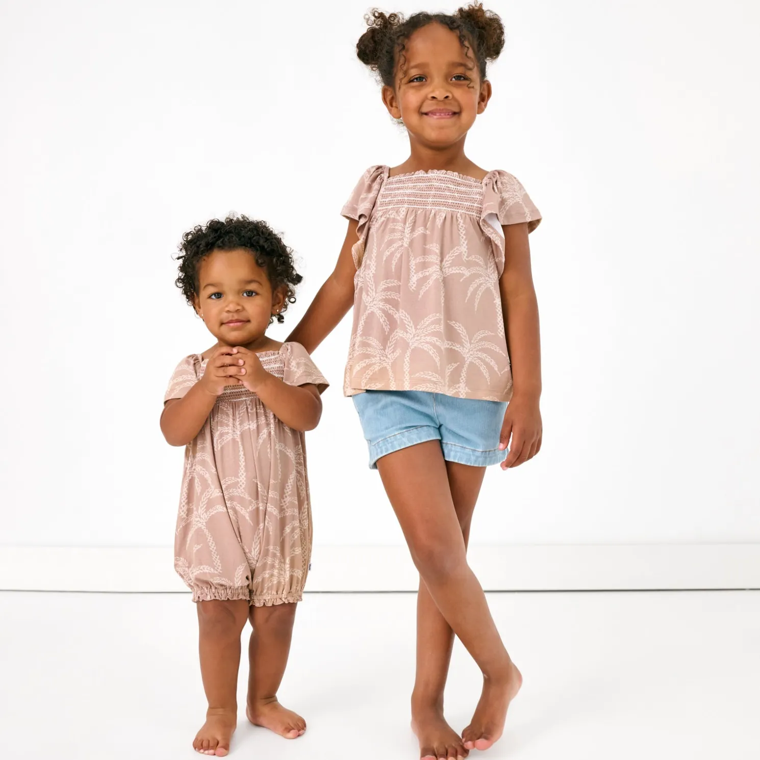 Sandy Palms Smocked Flutter Romper